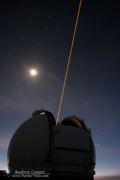 The Keck 2 AO Laser attempting the first target of the night with the light of sunset and a setting Moon behind
