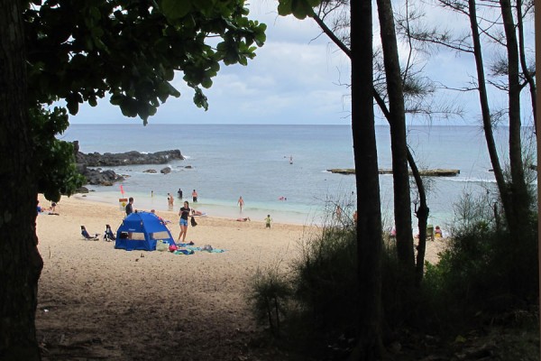The beach at Three Tables, North Shore, Oahu as seen from the parking lot