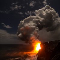 A heavy plume of gases trail from the 61G lava flow ocean entry