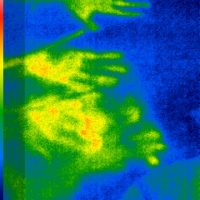Thermal image of hand prints left behind on a table top
