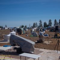 An assortment of telescopes wait out the day at oregon Star Party 2017