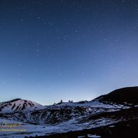 The telescopes of Mauna Kea on a snowy dawn