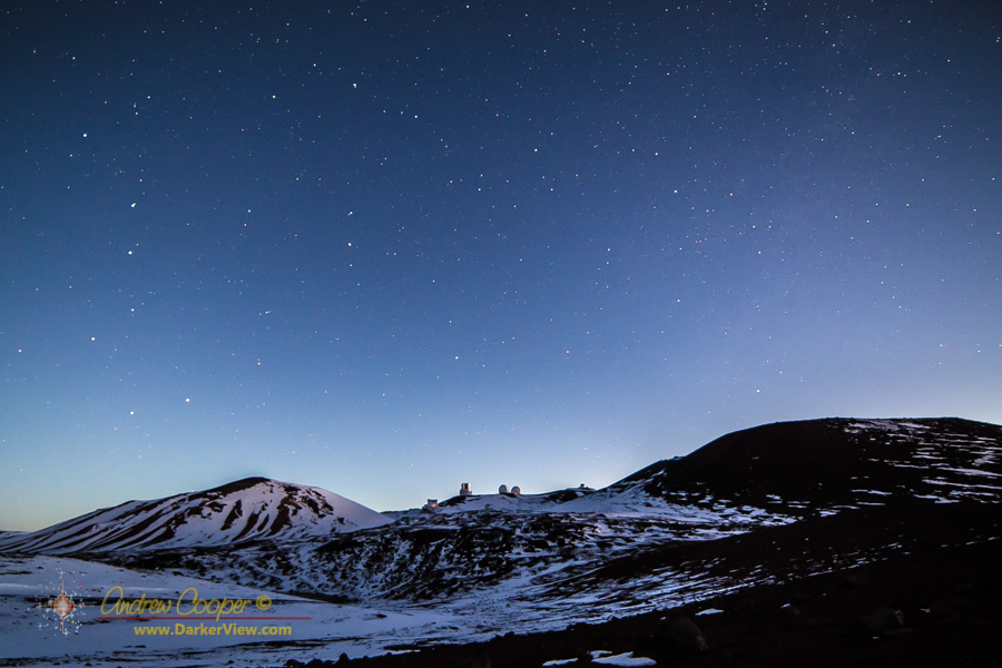 The telescopes of Mauna Kea on a snowy dawn