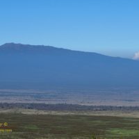 Hualālai peeks over a thick layer of volcanic smog, or vog