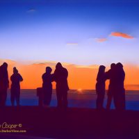 A crowd of tourists watching sunrise atop Mauna Kea