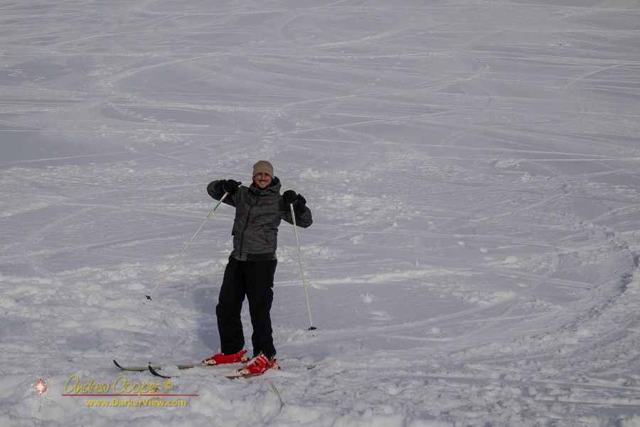 A skier shows his delight at the end of a run down the slope on Mauna Kea