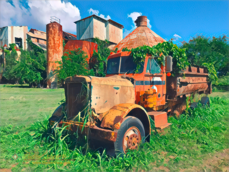 An abandoned truck sits outside the Kōloa sugar mill