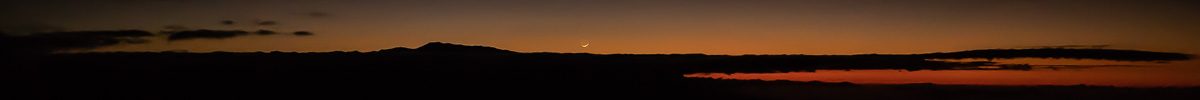 A young Moon sets over Hualālai