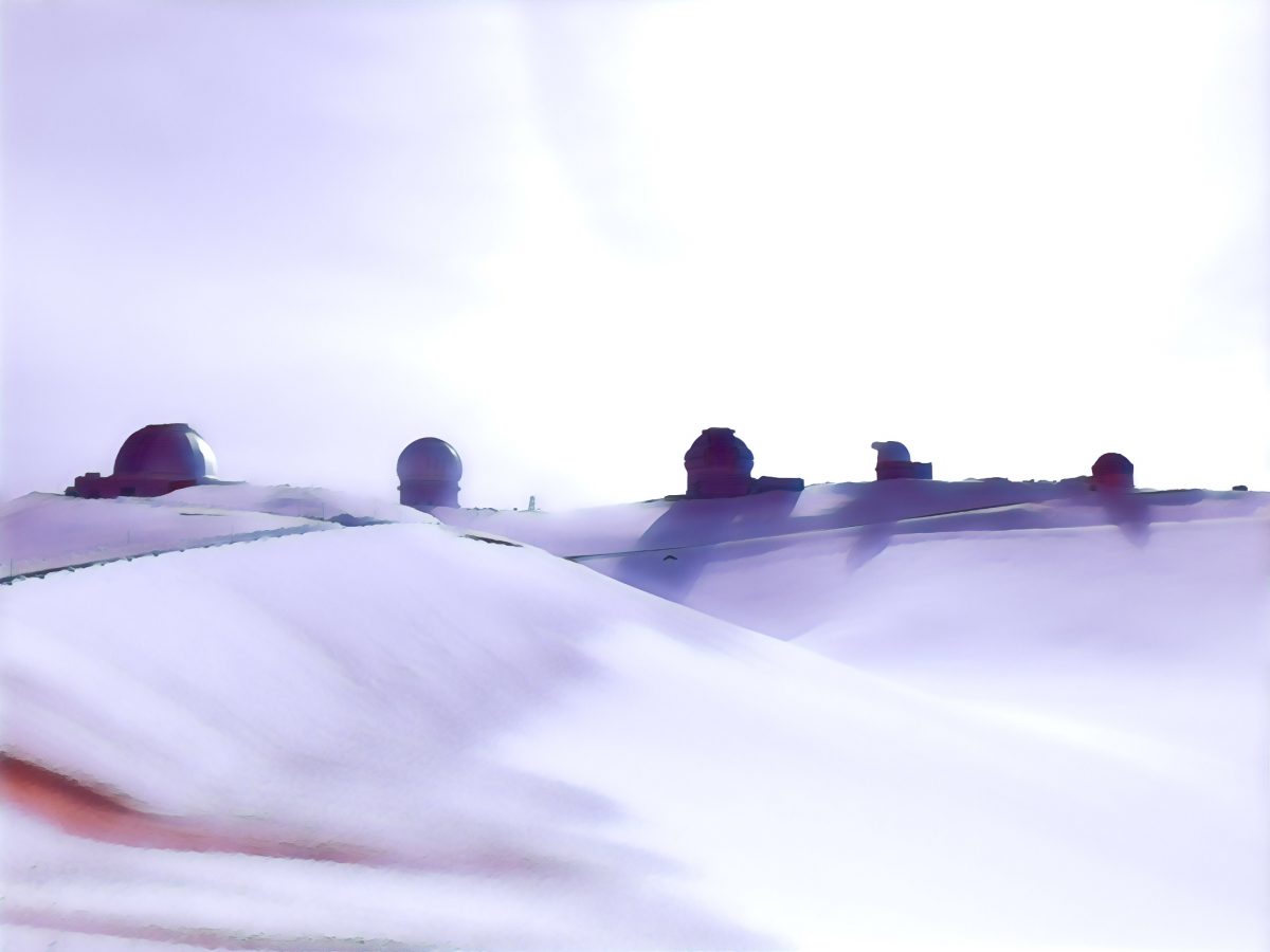 Fresh snow covers the summit puʻu on Mauna Kea