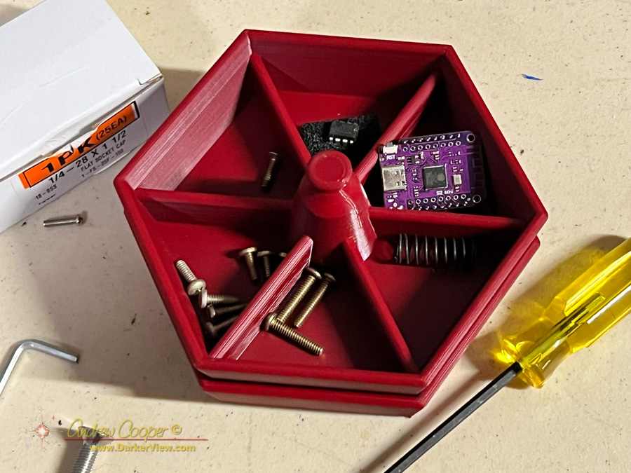 A stackable parts tray for use on the workbench