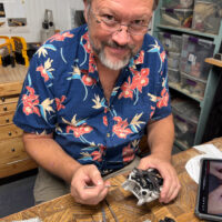 The author conducting surgery on a DJI Mini 4 Pro drone