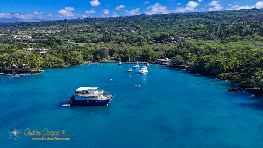 Looking across Keauhou Bay, Kona with the snorkel excusion boat the Fairwinds II in the foreground