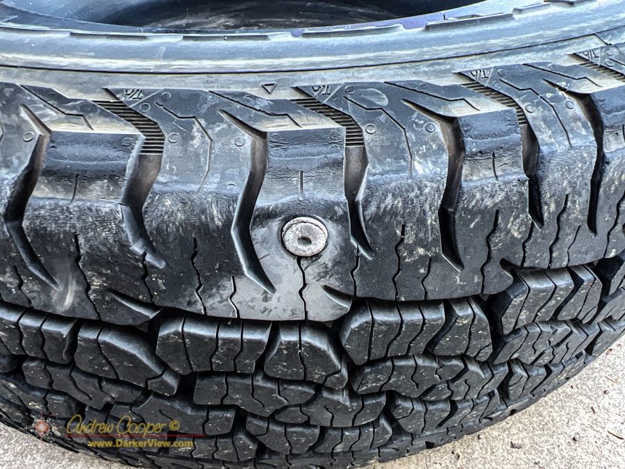 A machine screw in the tire