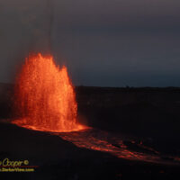 The tall lava fountian of episode 45 in Kilauea Caldera as photographed from the Keanakako'i Overlook, on the morning of April 23 , 2026