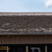 Tephra accumulation from recent eruptions on a roof at Kilauea Military Camp